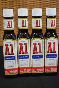 lot 82 image: 4 Bottles of A1 Steak Sauce Best By 62025
