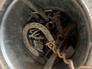 Bucket of Horse shoes and blacksmith stuff