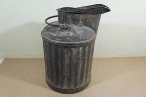 lot 184 image: Antique Gas and Oil Measuring Can