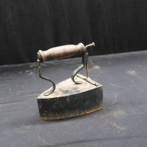 lot 32 image: ANTIQUE  SAD IRON