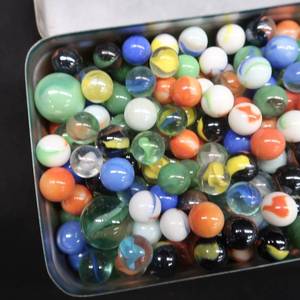 lot 41 image: UNIQUE YELLOW AND BLUE TIN WITH MARBLES