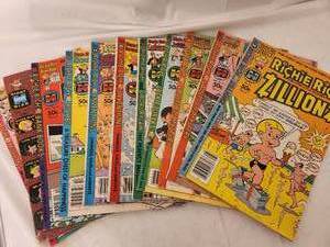 lot 210 image: Richie Rich Comic Books - Inventions Vol 18 & 20, Richie Rich and Cadbury No 19, Richie Rich and Jakie Jokers No 42, Richie Rich Vaults of Mystery No 33 & 42, Richie Rich Zillionz, Riches, Bank Books, & Millions