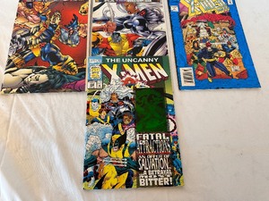 lot 180 image: Marvel Comics X-Men 2099, Uncanny X-Men Celebrating 30 Years of X Men, Special X-Men Anniversary Issue October X-Men 1995 & January X-Men 1996