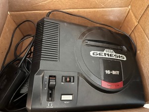 lot 51 image: Sega Genesis 16 Bit 1989 Powercord, Two Controllers, rf Switch - Did not Test, Sega Genesis 688 Attack Sub Game and World Champ Soccer