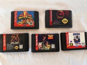 lot 54 image: Sega Genesis Games - Power Rangers, Mortal Combat 3, Mortal Combat, Toy Story, Prime Time Starring Deion Sanders
