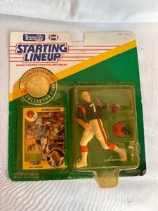 lot 69 image: Team NFL Starting Lineup Sports Super Star Collectibles Boomer Esiason 1991 Card and Action Figure