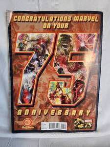 lot 273 image: Two Marvel 75th Anniversary Celebration Books - 1 with slight water damage and bent corner