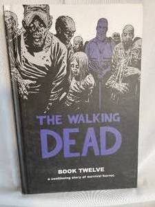 lot 300 image: The Walking Dead Volume 1 & Book 12