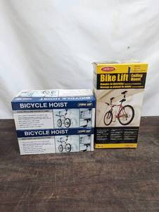 lot 63 image: Three Bike Lifts