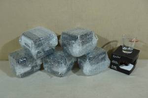 lot 72 image: 6 Shot Glasses with Embedded Bullets