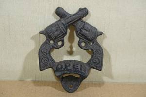 lot 114 image: Twin Pistol Cast Iron Bottle Opener