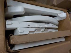 lot 2 image: Suncast Adirondack Chair with Storage needs assembly