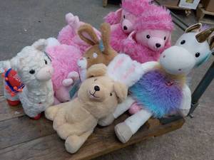 lot 29 image: Stuffed Hug Pets new with tags