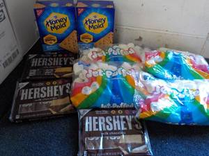 lot 124 image: 2 Boxes Honey Maid Graham Crackers, 4 bags Jet Puffed Marshmallows and 3 - 6 packs Full Size Candy Bars