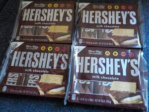 lot 129 image: 4 - 6 packs Hersheys Full Size Candy Bars