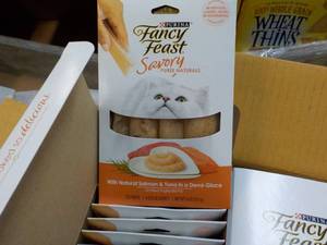 lot 136 image: 30 ct Purina Fancy Feast Savory Cat Treats Natural Salmon and Tuna in a Demi Glaze best date 082023 Retail $90 total