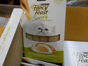 lot 143 image: 30 ct Purina Fancy Feast Savory Cat Treats Natural Chicken in a Demi Glaze best date 082023 Retail $90 total