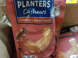 lot 207 image: 12 x 5 oz Bags Planters Cashews Cinnamon and Brown Sugar best date 092023