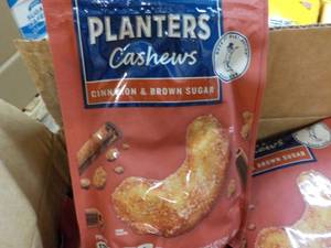 lot 209 image: 12 x 5 oz Bags Planters Cashews Cinnamon and Brown Sugar best date 092023