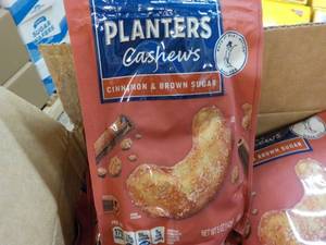 lot 210 image: 12 x 5 oz Bags Planters Cashews Cinnamon and Brown Sugar best date 092023