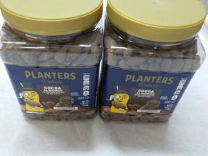 lot 291 image: 2 x 2 lb. 5 oz Bags Planters Cocoa Almonds