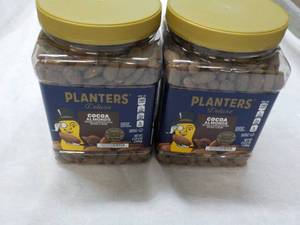 lot 292 image: 2 x 2 lb. 5 oz Bags Planters Cocoa Almonds