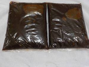 lot 394 image: 2 x 96 oz bags Sweet Baby BBQ Sauce