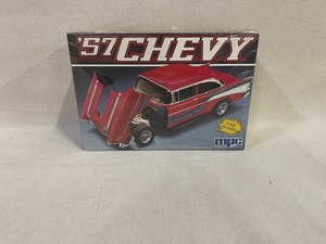 lot 11 image: 1957 Chevy - Factory Sealed