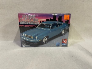 lot 65 image: 1977 Ford Mustang II Street Custom - Factory Sealed