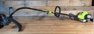 lot 92 image: RYOBI 25 cc 2-Stroke Attachment Capable Full Crank Curved Shaft Gas String Trimmer