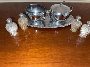 Set of silver plate coffee creamer, sugar bowl and tray and 2 sets of salt and pepper shakers