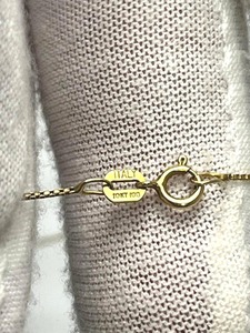 lot 103 image: 1.3 grams 24 10KT (Italy) Gold Necklace - Read Description
