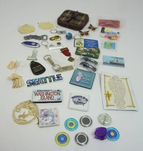A Lot of Trinkets Keychains Refrigerator Magnets Etc.