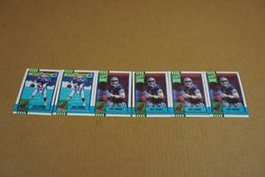 lot 198 image: 5 Topps Troy Aikman Rookie Cards