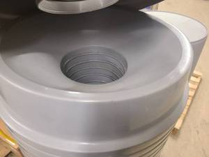 Stack of trash cans with collection lids