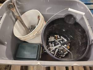 Box of garage tools, wrenches, sockets and more.