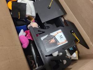 Box of Mickey Mouse and Disney Graduate Gear