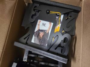 Box of Graduation themed mugs, picture frames and stuffed animals