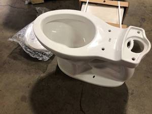 lot 47 image: American Standard Champion Two-Piece 1.28 GPF Single Flush Elongated Chair Height Toilet with Slow-Close Seat in White Costumer Returns See Pics