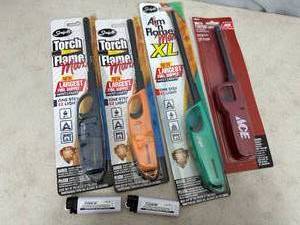 lot 133 image: 4 New Long Reach Specialty Lighters Plus 2 Standard Lighters