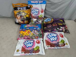 lot 234 image: Blow Pops, Pez Dispensers, Charms, Etc