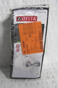 lot 76 image: Delta Foundations Wall Mount Spring-Loaded Toilet Paper Holder Bath Hardware Accessory in Polished Chrome