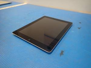 lot 59 image: Apple&nbspiPad 4th Gen A1460 Tablet  16GB of storage  Cellular Carrier Unlocked  Includes Charging Cable  Scratch on bottom left corner of screen 