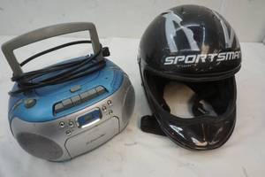 lot 141 image: Emerson radio and helmet