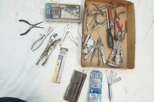 lot 194 image: Assorted tools, vice grip, snap rings, needle nose pliers