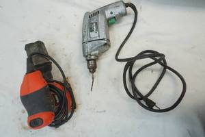 lot 202 image: Drill and Black and Decker sander