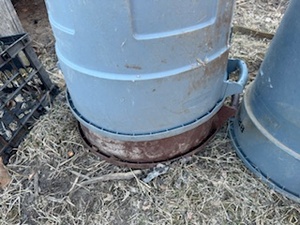 Three Garbage Cans and Stack of 5 Gallon Pails