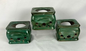 lot 67 image: Three Vintage Stangl Pottery Terra Rose Green Stove Candle Warmers