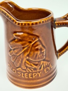 lot 168 image: 1986 Western Stoneware Collectors Convention Old Sleepy Eye Mug