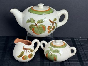 lot 114 image: Vintage Stangl Pottery Orchard Song Teapot, Cream and Sugar Set